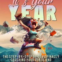 Motivational book cover with woman celebrating atop mountain peak.